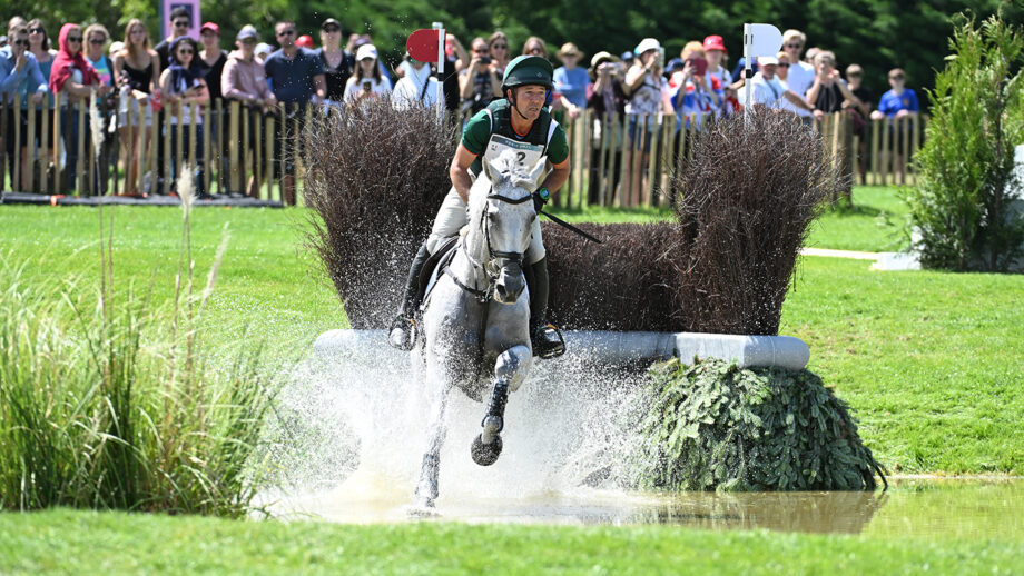 Burghley Horse Trials riders include Austin O’Connor, pictured cantering Colorado Blue through the water after jumping a brush fence at the Paris Olympics.