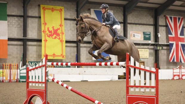 Fiona Holohan clears 1.55m to finish first equal in the six-bar at Morris Equestrian Centre
