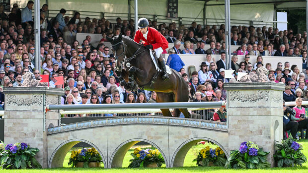 Harry Meade and Cavalier Crystal in the Burghley Horse Trials showjumping in 2024.