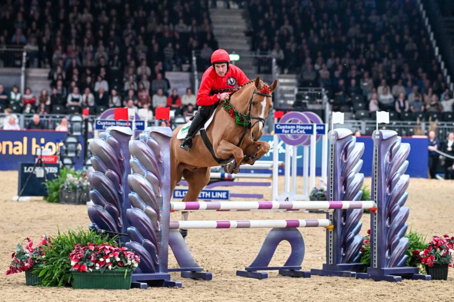 Harry Skelton and Billy Angelo lead the winning team in the Markel Jockeys Jumping in aid of the Injured Jockeys Fund at the London International Horse Show.