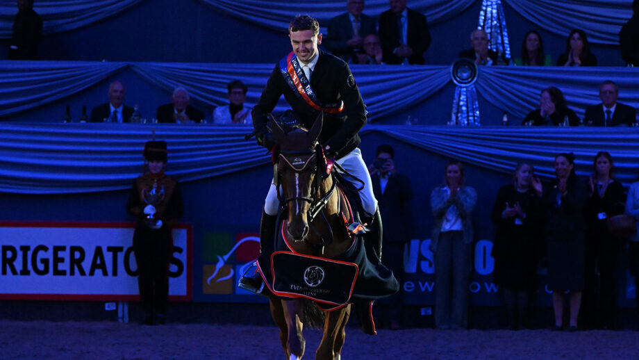 Jordan Thompson canters down the centre line at HOYS on Double De Muze TL after winning the Talent Seekers final at HOYS