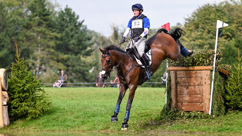 Phillip Dutton and Denim just a skinny with brush top into a pond at Blenheim International Horse Trials 2024.