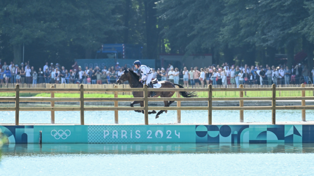 Great Britain remains in the gold medal position following the Olympic cross-country today. Pictured Britain's Tom McEwen and JL Dublin.